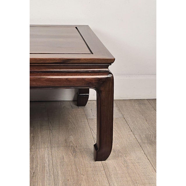 A late 19th-century Chinese Kang table in the Ming style in mu wood.