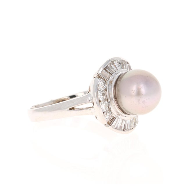 Natural Tahitian Pearl Natural Baguette Diamond 14 Karat White Gold Ring This ring has a 8mm natural Pearl and is...