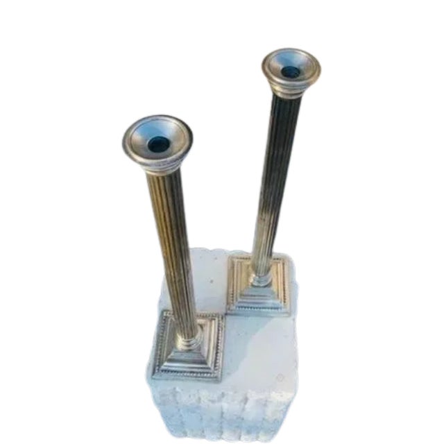 Two Striking Tall Pillar Candlesticks, a Eye Catching elegant way to illuminate any room with a pair of candles for all...