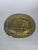 17th-century brass offering dish with "Chinese" decoration. The brass is finely engraved with scrolling foliage and scenes...
