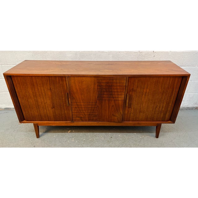 Beautiful nine-drawer "Elegette" dresser by Furnette Industries. Expertly crafted in rich walnut, this substantial piece...