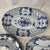 These are vintage Lillian Vernon blue and white porcelain decorative plates featuring classic floral transfers and woven...