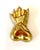 A small gilt bronze brooch named "Chateau en Espagne" by French Parisian art jewelry and sculpture Line Vautrin...
