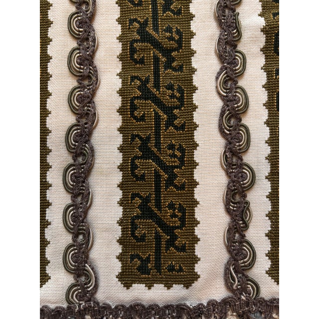 Vintage hand-embroidered textile table runner or vanity mat. Features vertical needlework bands framed by applied novelty...