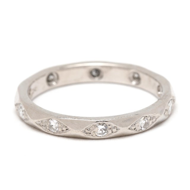 Stones: diamonds, 10 stones single cut round 1.75 mm approximately .15 total carats F-G color, VS2-SI1 clarity Ring Size 5...