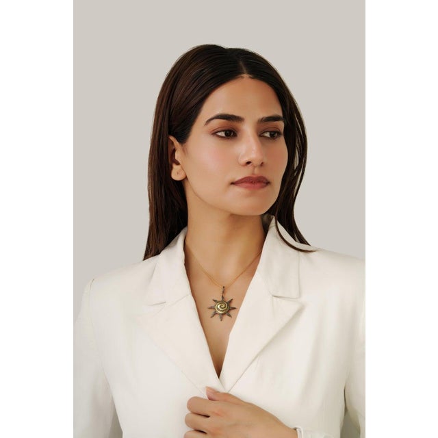 Crafted in 925 sterling silver, this elegant 2.05-carat diamond pendant showcases timeless sophistication with radiant...