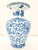 Blue & White Chinese Floral Motif Porcelain Vase $300 Elegant Chinese style blue and white porcelain vase featuring a...