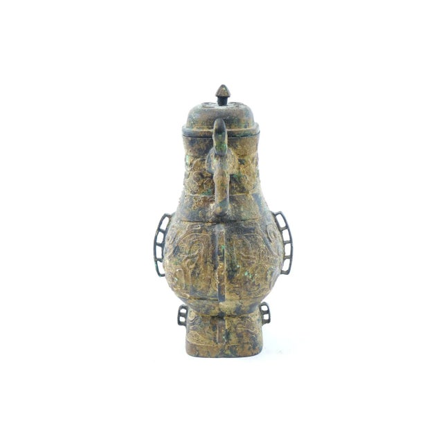 Antique Far East Bronze Urn - 9" x 7.5" x 14" Originally purchased in Washington DC. It was a prat of a collectors belonging.