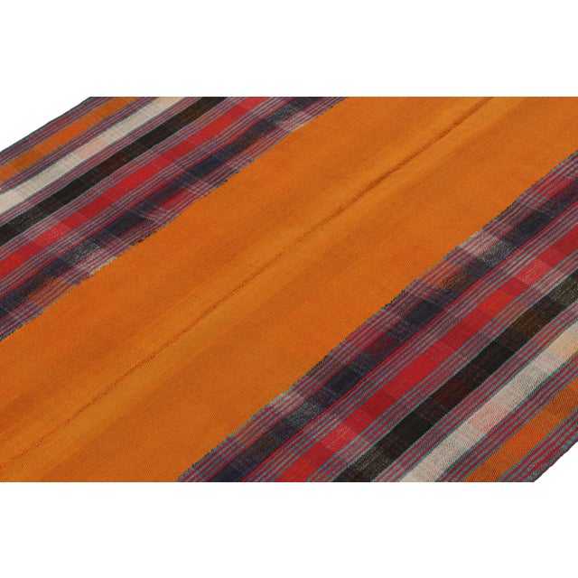 This vintage 5x7 Persian kilim is handwoven in wool, and originates circa 1950-1960. On the Design: This design remarks...