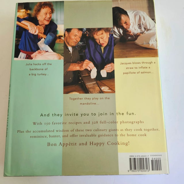 The product is the first edition of the book "Julia and Jacques Cooking at Home: A Cookbook" by Julia Child and Jacques...