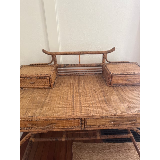 Standout vintage British Colonial Style desk crafted in faux burnt bamboo and grasscloth featuring a pagoda style top over...