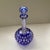Classic Czech Cobalt blue cut crystal decanter with clear thumbnail design. Tall collared neck and cut crystal stopper....