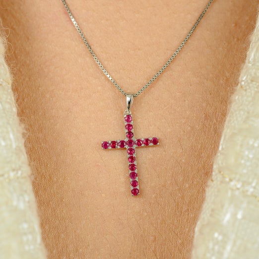 Natural Ruby Cross Pendant Handcrafted Unisex Gift in 18K Gold studded with round cut ruby set in prong setting. This...