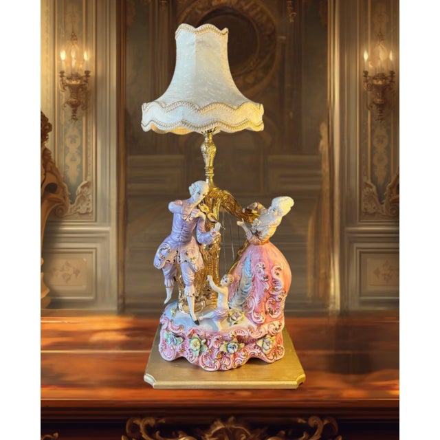 This impressively large Mid-Century Azzolin Brothers Capodimonte Porcelain Table Lamp captures an 18th century scene...