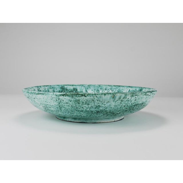 This is a beautiful, large decorative ceramic pottery bowl from the 1980s, designed and handcrafted in Italy by Eva...