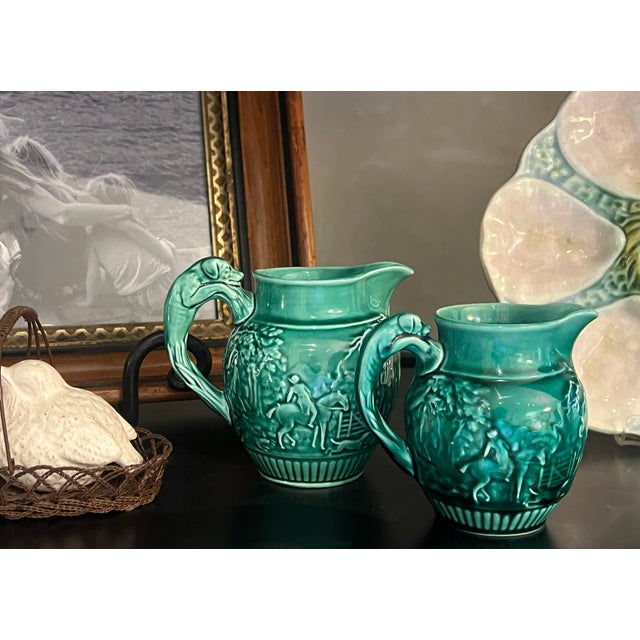 Hunting themed pitcher set of two by Wedgwood, made in England in the 1940's. Larger pitcher : 5.5"wide across handle x...