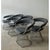 This vintage set of six Platner-style wire dining chairs brings sculptural mid-century elegance to the dining room. Each...