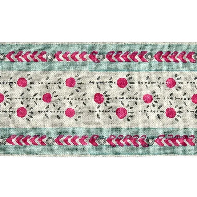 An intentionally naive design, this sweet little floral tape is hand blocked to accentuate its charm. Sold as a 2-yard...