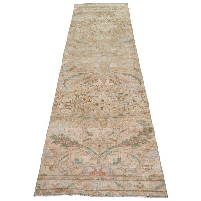 Hand-knotted with care using traditional rug-making techniques, this wool rug blends timeless craftsmanship with a modern...