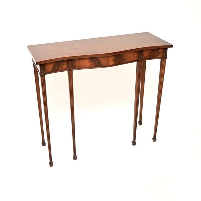 A beautiful and very well made antique Edwardian console table. This was made in England, it dates from the 1900-10...