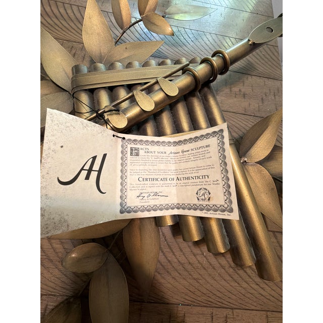 Pipes of Pan with flute and olive branches depicting the evolution of the musical pipe. #210036 Minstrel Finish-burnished...