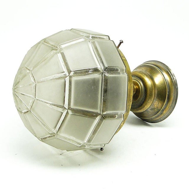 The pendant lamp was produced at the beginning of the twentieth century. It is made in the Art Nouveau style. The...