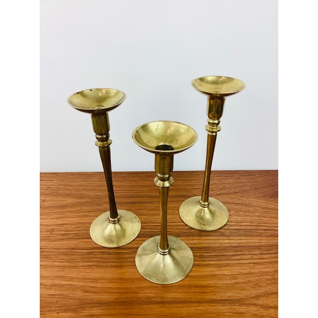Vintage Set of 3 Brass Candle Holders graduated sizes tall with fluted base each holds a standard taper candle made of...