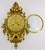 The 1960s Vintage Swedish Rococo Style Cartel Wall Clock by Westerstrand Töreboda is a stunning piece of antique decor...