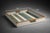 A charming coastal-style wooden serving tray featuring rope-wrapped handles and a slatted base in soft sea-green and...