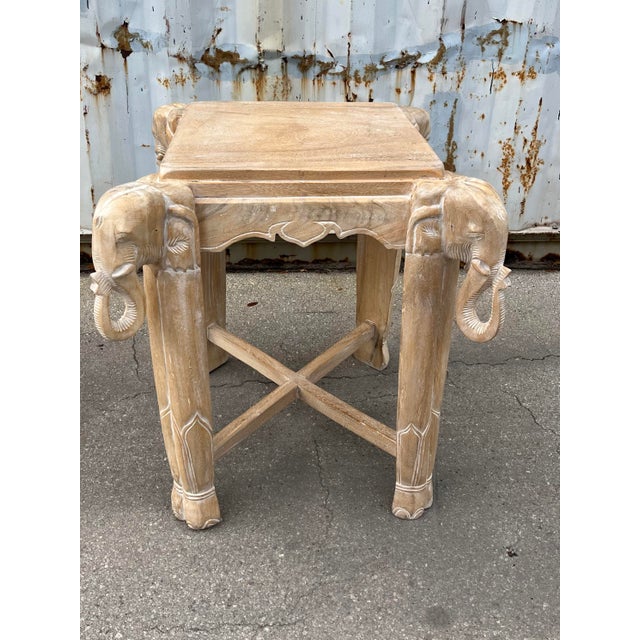 Late 20th Century Cerused Hand Carved Elephant Center / Accent Table. Features a beautiful Bohemian/Coastal Style, four...
