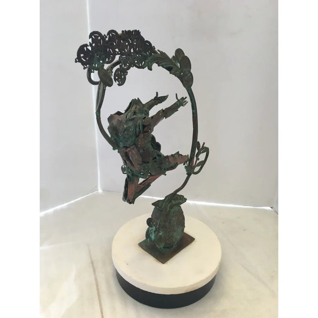 Vintage copper sculpture by Snell. The base of the sculpture is 10”.