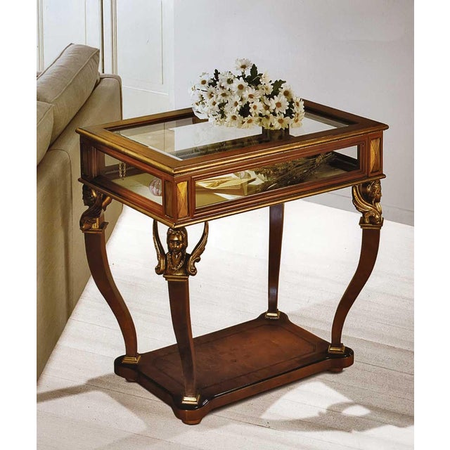 Handcrafted in Italy from olive ash burl, this curio end table features clear beveled glass panels on all four sides,...