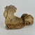 A gorgeous cast-stone rooster that's been salvaged from further ruin. It's so charming that the little chipping it has...