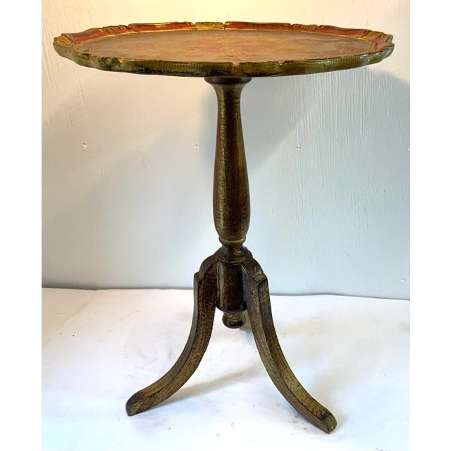 Lovely Italian wine or drink table with round scalloped top with red accents!