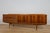 The elegant long sideboard was from the Hamilton Rosewood series, an award-winning design by Archie Shine in 1958. Like...