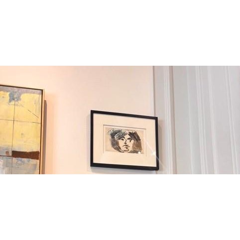 A striking pair of original figurative portrait studies by Thibon, executed in bold black ink with confident, gestural...