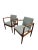A set of two danish teak armchairs that would make excellent addition to a dining chair set. Reupholstered with a high...