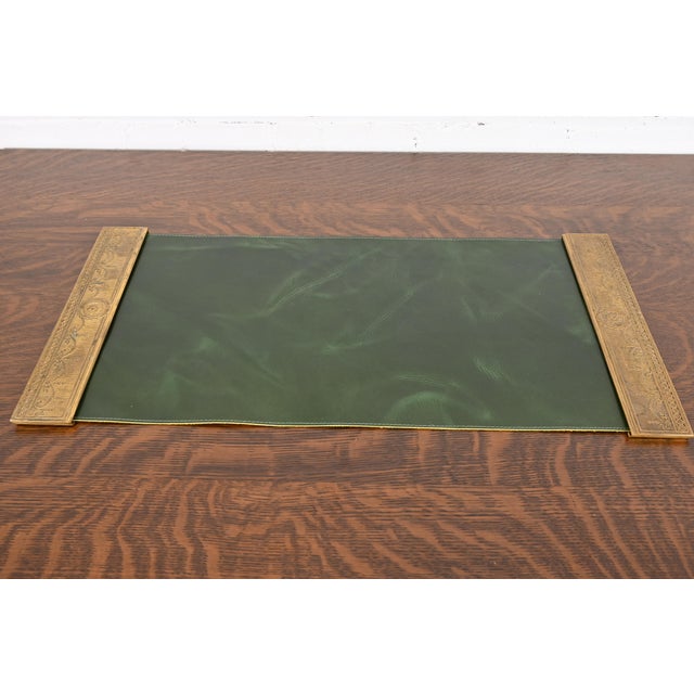 A gorgeous pair of Art Deco period gilt bronze blotter ends featuring Adam style or Neoclassical style swags, with a...