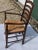 Vintage ladder back oak arm chair is in good condition. This chair has few imperfections. It is sturdy and would be a...