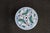 Porcelain chinoiserie garden stool with floral and bird motif. Classic drum form with pierced sides and painted detail....
