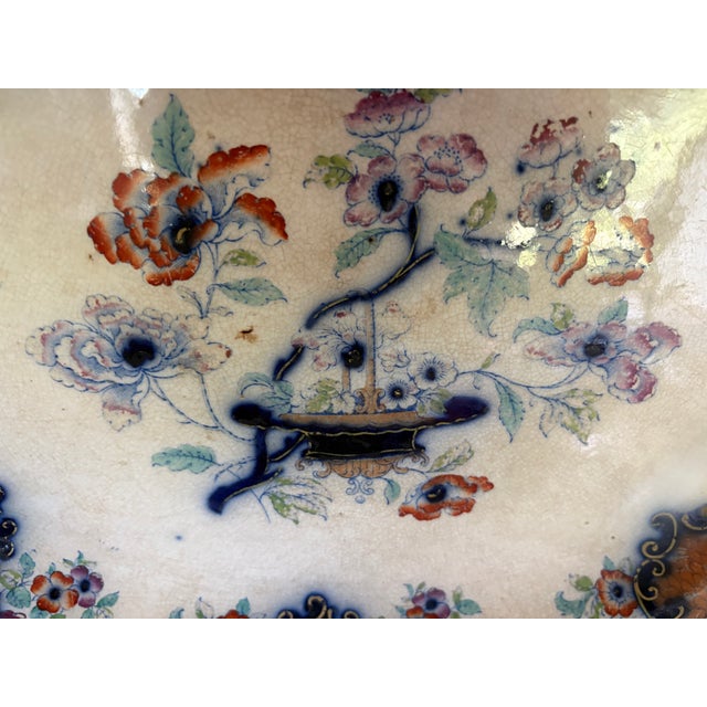 This is a large serving platter perfect for a turkey or large ham. The platter appears to be Minton but it is unmarked....