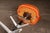 Plastic Pair of MCM Orange Vinyl Swivel Chairs by Chromcraft For Sale - Image 7 of 8
