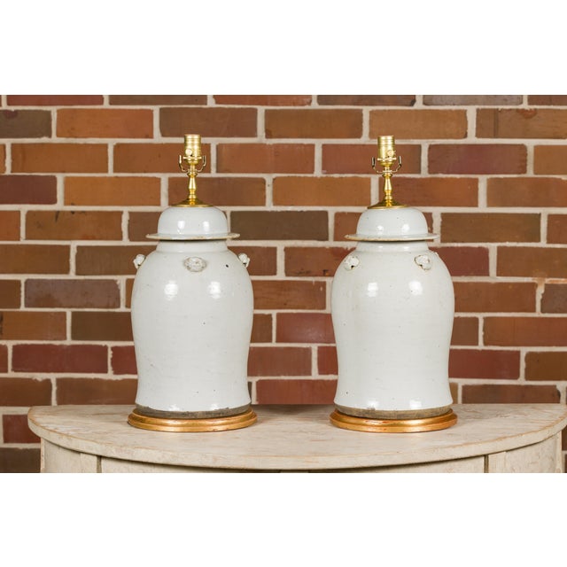 Early 21st Century Asian Modern White Porcelain Lidded Urns on Gilded Bases - Pair For Sale - Image 5 of 12
