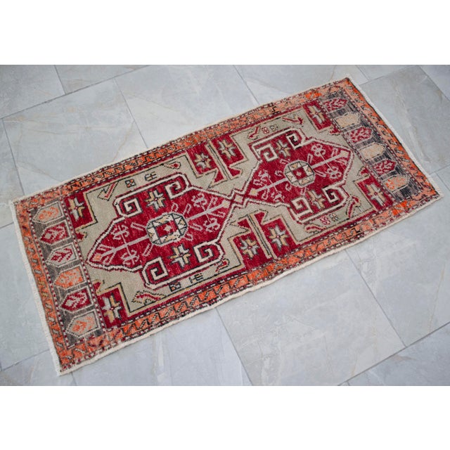 a Vintage Turkish Small yastik rug, yellowish gray background yastik rug perfect for entryway, bath or in front of the...