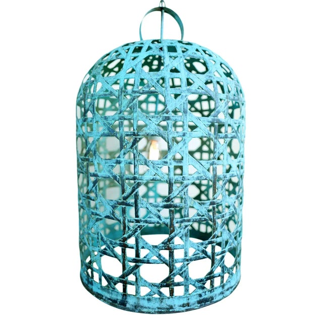 Open cane style weaved copper bell shaped lantern. Beautiful verdigris patina. This unique, handmade lantern will add...