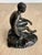 Bring a touch of classical antiquity to your shelf or desk with this fine bronze study of the "Seated Hermes." Depicting...