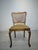 Chippendale-style chair with wickerwork and springs Chippendale-style chair with a wickerwork and spring backrest and a...