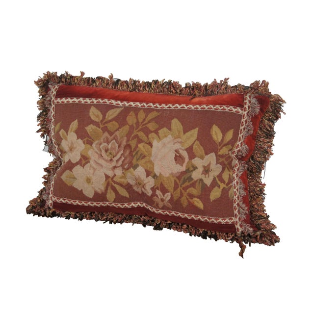 20th century rectangular lumbar / throw pillow, embroidered with an array of roses / flowers in rust red, pink, gold, and...