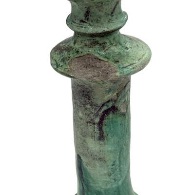 A Moroccan Tamegroute glazed candlestick holder is a handcrafted piece made in the historic pottery village of Tamegroute...