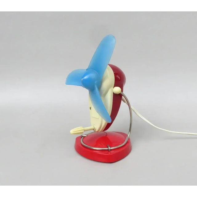 A colorful, in the color combination red, beige with blue rare small fan from Philips, model HA 2728, from the 1960s....